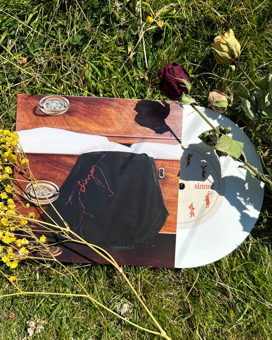Sinner: Limited White Vinyl 7" Single