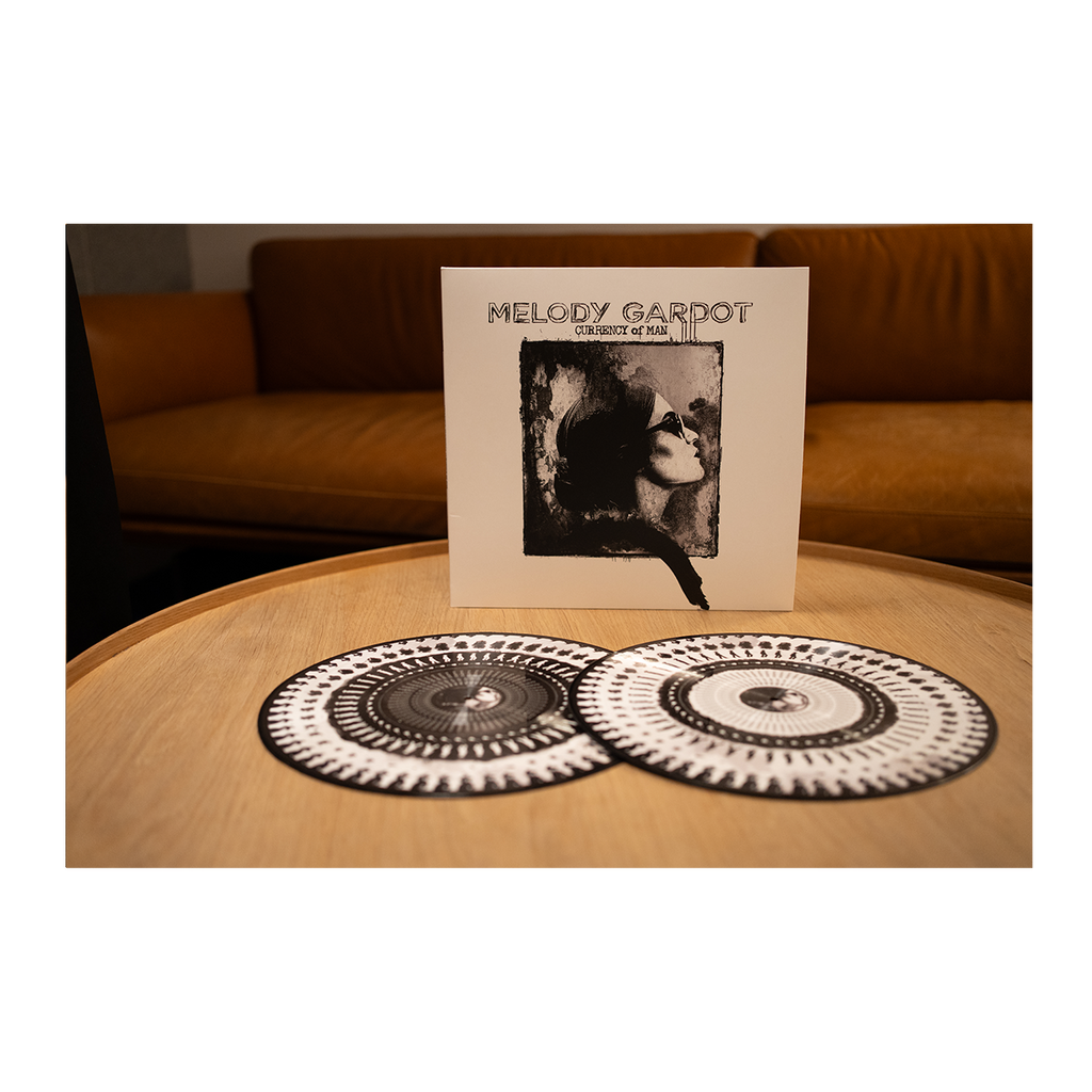 Currency Of Man - 10 Year Anniversary (Zoetrope Vinyl)
