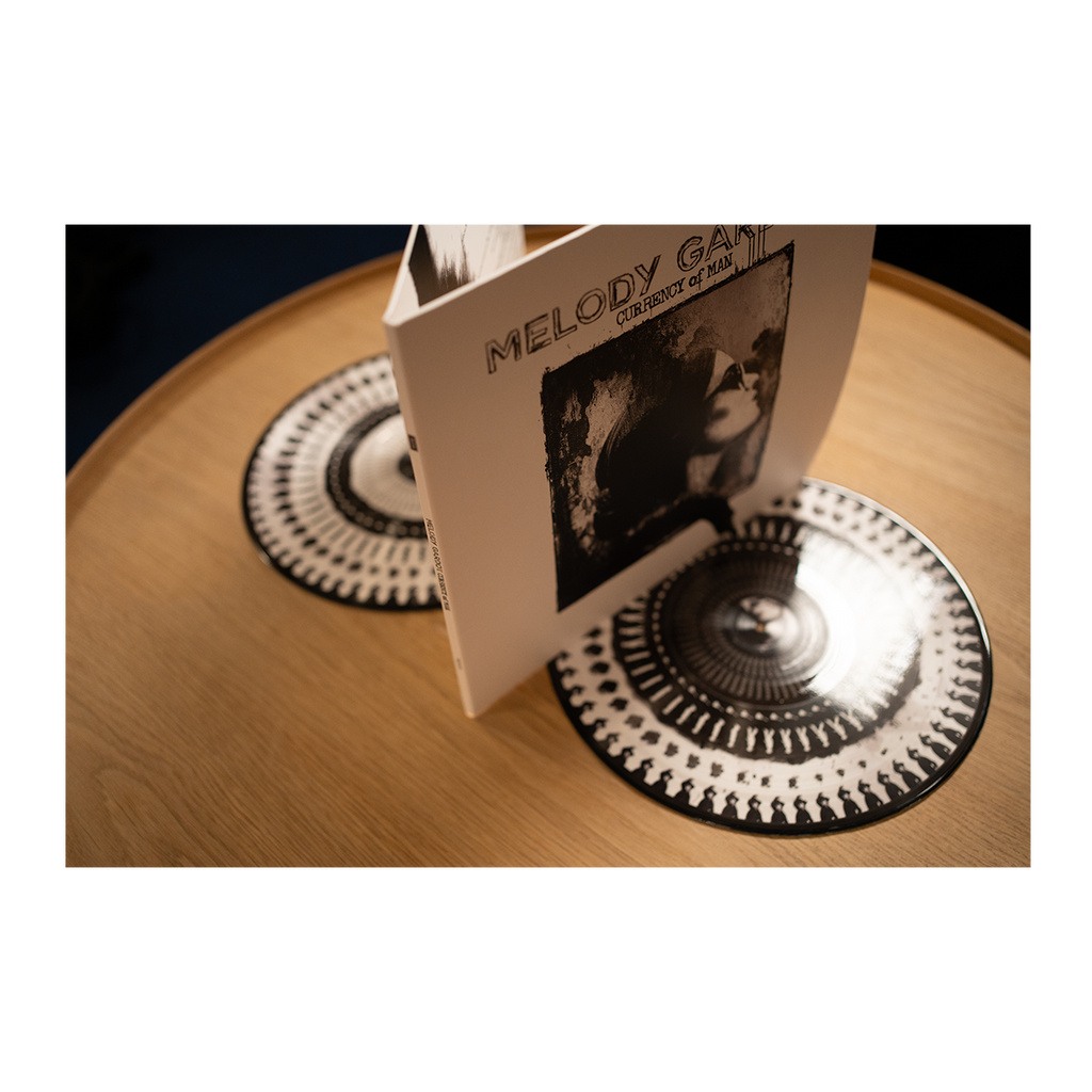 Currency Of Man - 10 Year Anniversary (Zoetrope Vinyl)