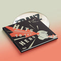 Hits To The Head: Deluxe Hardback Book-Style sleeve CD